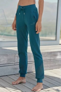 KangaROOS Relaxhose mit Lochmuster am Beinsaum Petrol, Schwarz